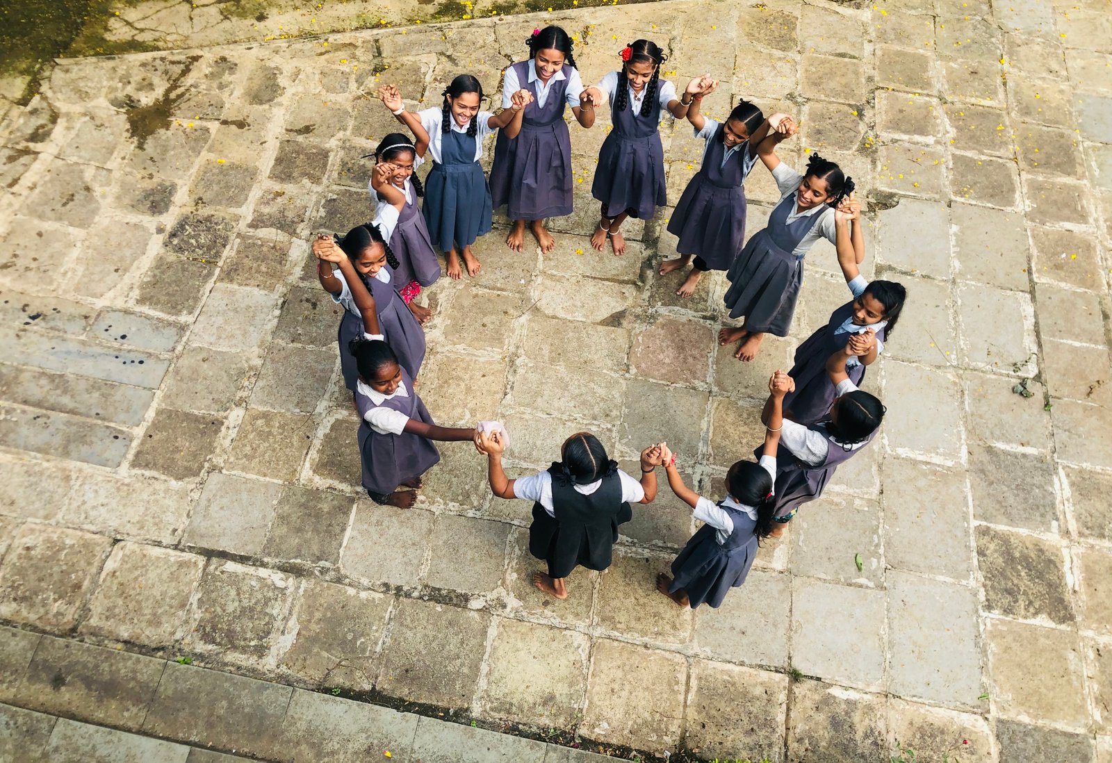 Menstrual health session with adolescent girls in a classroom.